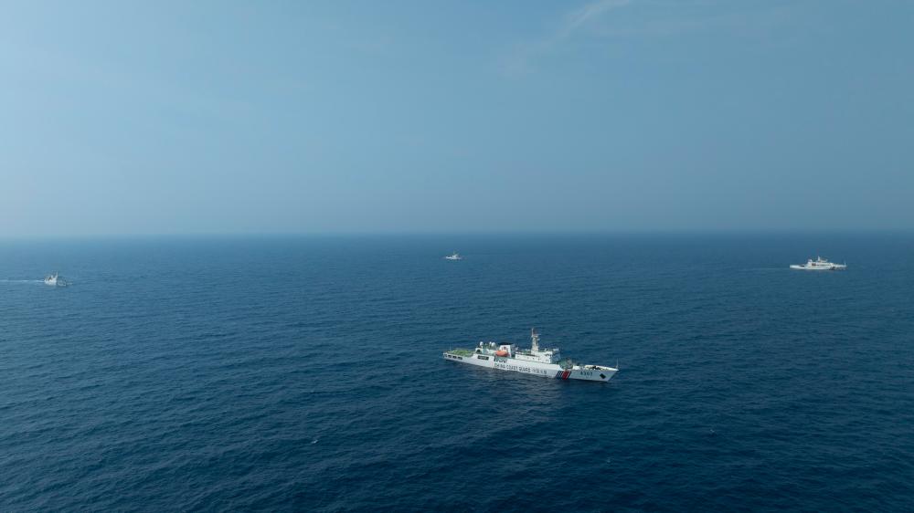4月22日，中越海警艦艇編隊在北部灣海域開展聯(lián)合巡邏。（中國海警供圖）